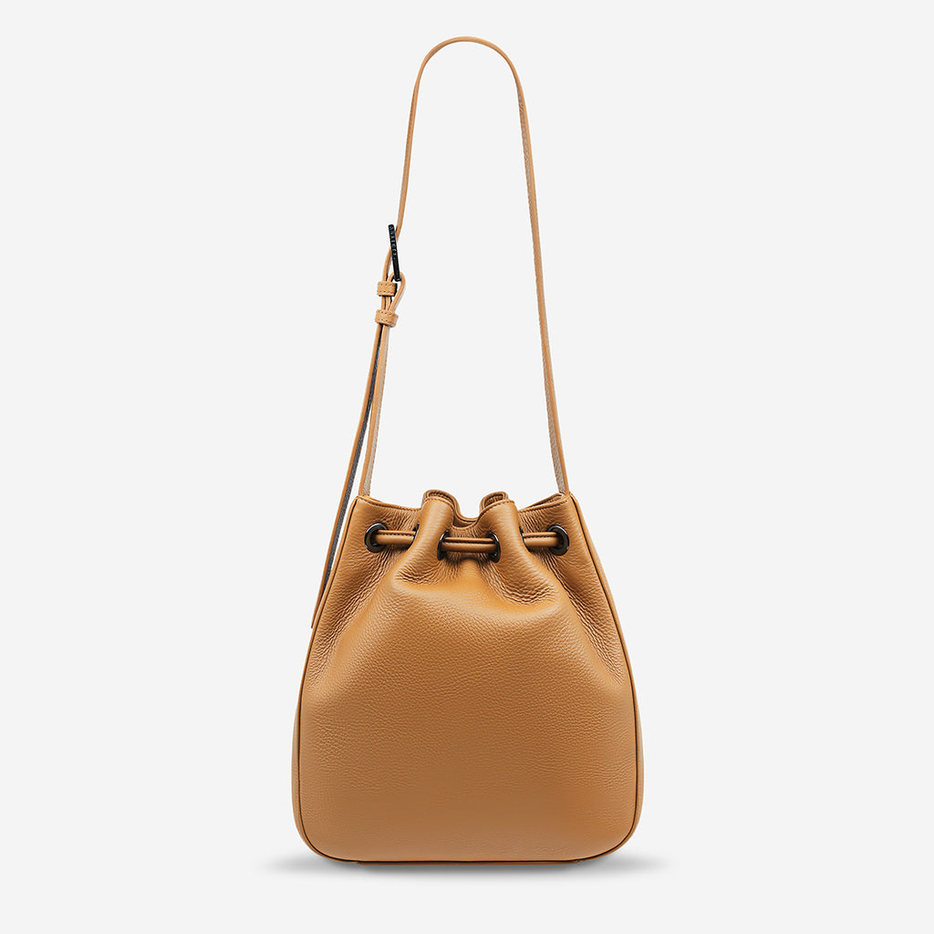 Seclusion Women's Tan Leather Bucket Bag | Status Anxiety®