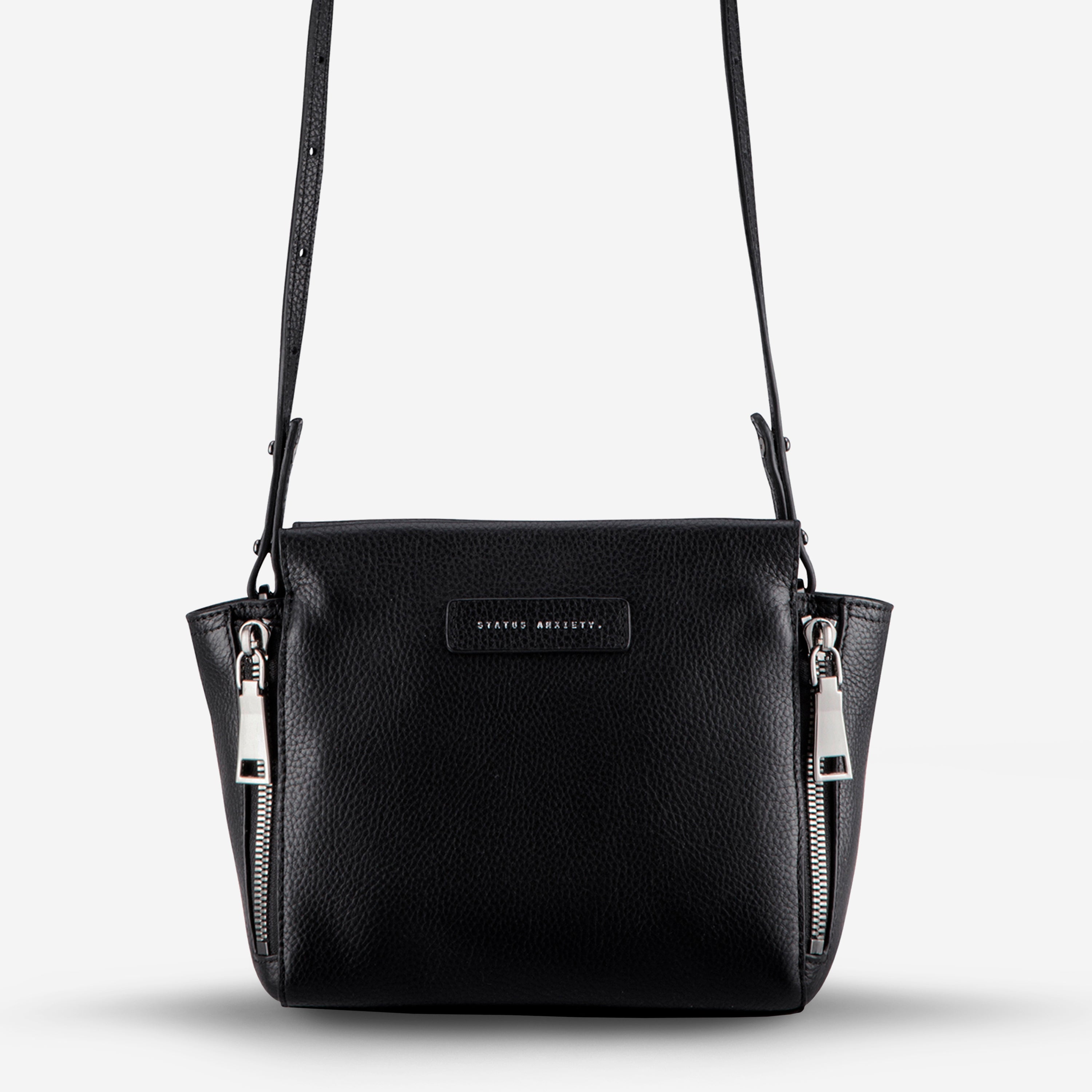 Black pebble store leather handbag