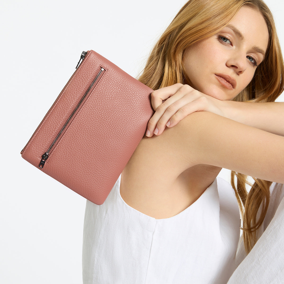 New Day Women s Dusty Rose Leather Clutch Status Anxiety